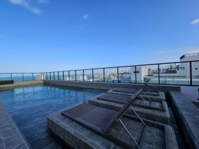 Conforto em família - Flat a 50m da praia